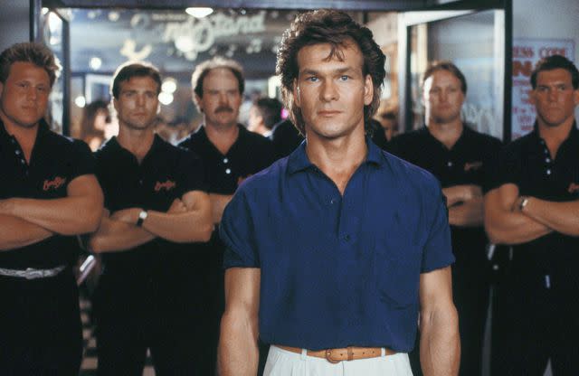 <p>MGM/UA/Kobal/Shutterstock</p> Patrick Swayze (center) in 'Road House,' 1989