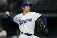 Texas Rangers starting pitcher Kohei Arihara throws to an Oakland Athletics batter during the first inning of a baseball game in Arlington, Texas, Tuesday, Aug. 16, 2022. (AP Photo/Tony Gutierrez)