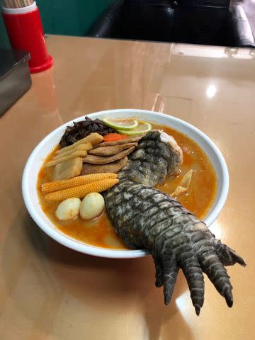 <p>SWNS</p> Crocodile Ramen From Taiwanese Restaurant Creates a Buzz Online