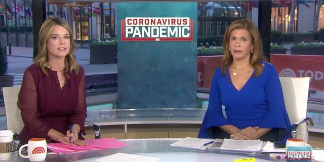 Two news anchors in front of a graphic that reads &quot;Coronavirus pandemic&quot;