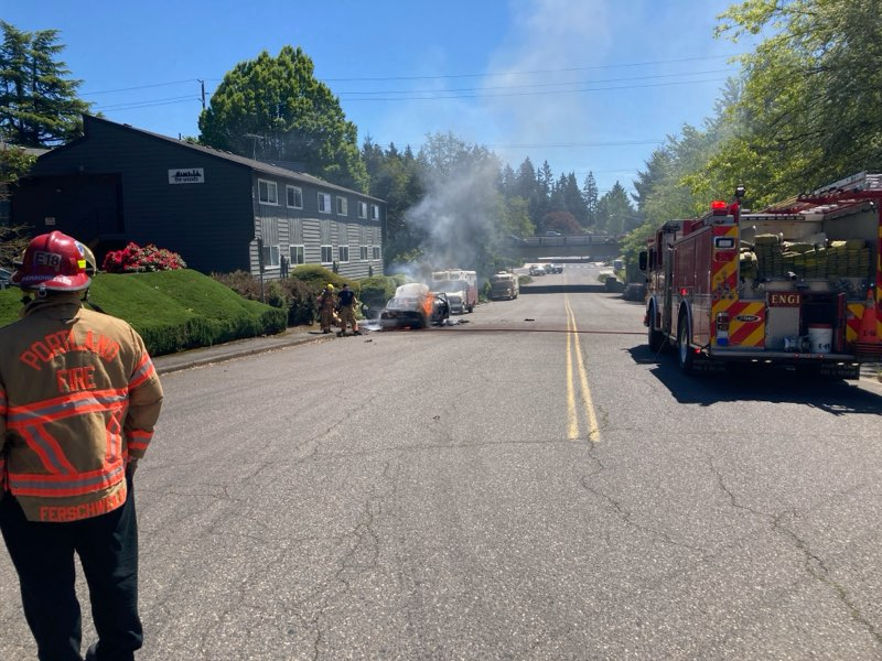 A woman was arrested Thursday after allegedly stabbing two cars and setting one on fire in Southwest Portland. May 9, 2024 (courtesy Portland Police Bureau).