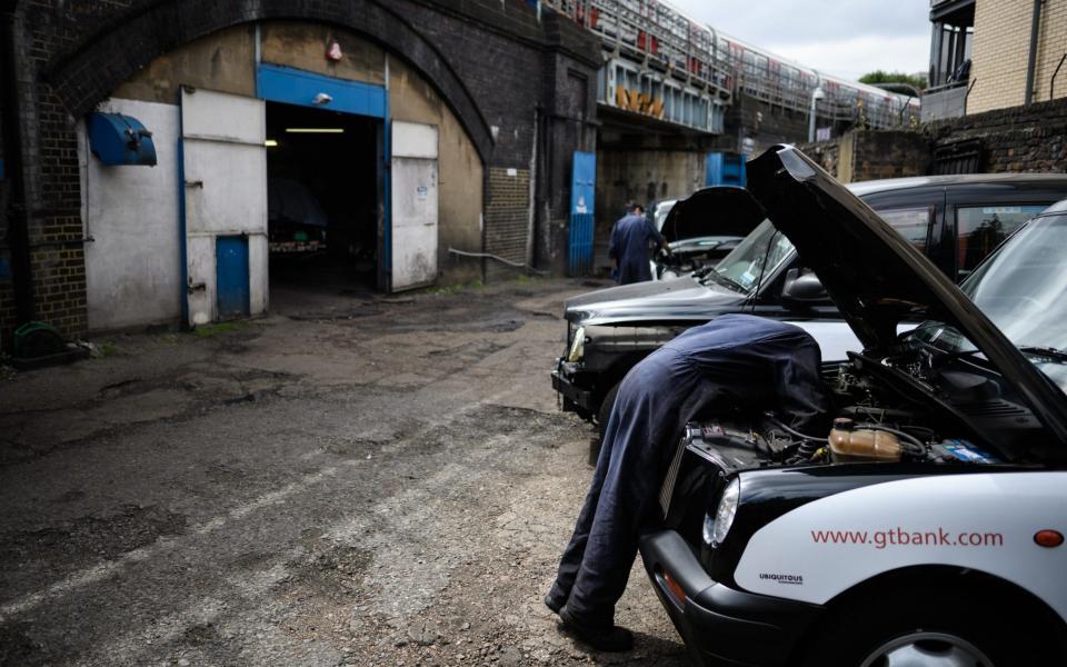 Working on taxis in Bow - Leon Neal/Getty Images Europe