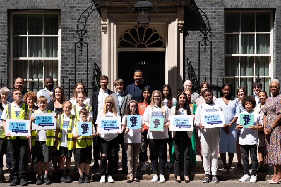 Rio Ferdinand poses for photographs with children at 10 Downing Street to celebrate the launch of the Diana Award’s annual anti-bullying campaign Don’t Face It Alone (Stefan Rousseau/PA) (PA Wire)