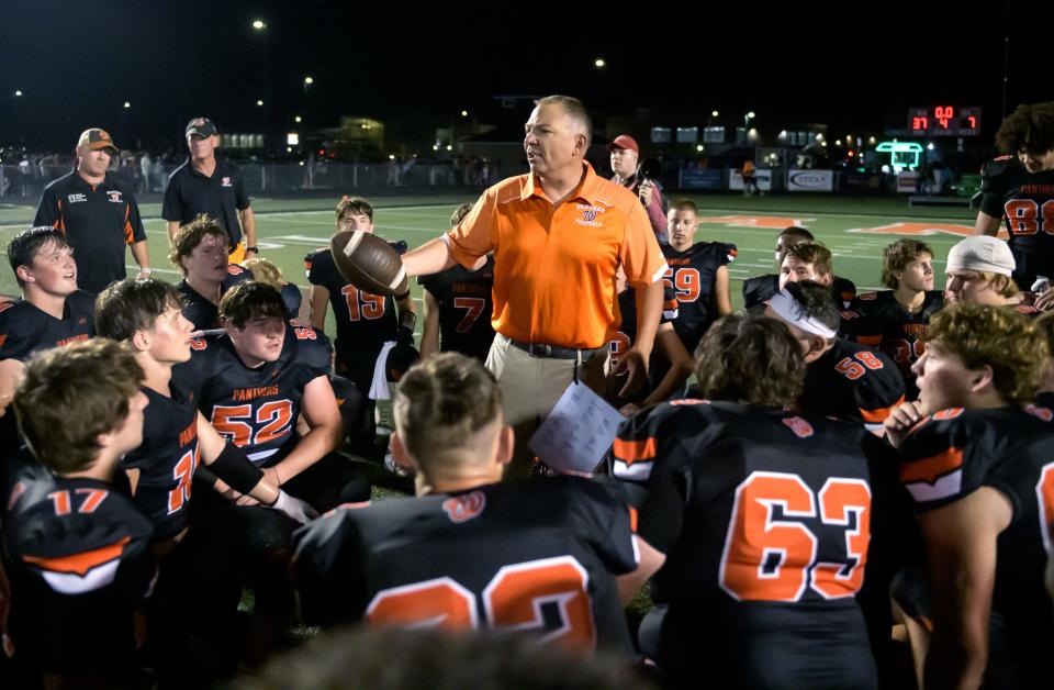 Washington head football coach Todd Stevens talks with his team after receiving the game ball following the Panthers' 37-7 win over the Metamora Redbirds in their Week 3 football game Friday, Sept. 13, 2024 at Babcook Field in Washington.