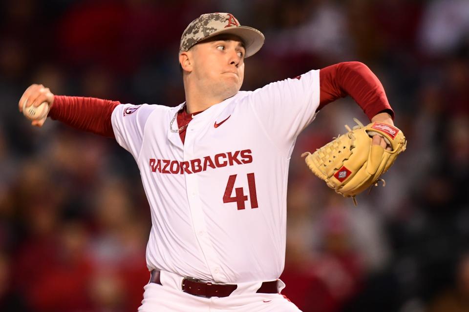 Arkansas baseball's Will McEntire fires a pitch during the Razorbacks' 5-2 win over Ole Miss Thursday, April 4, 2024.