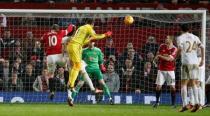 Football Soccer - Manchester United v Swansea City - Barclays Premier League - Old Trafford - 2/1/16 Swansea's Lukasz Fabianski heads at goal Reuters / Andrew Yates Livepic