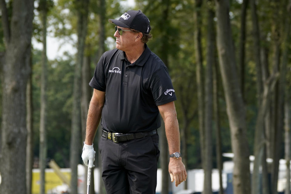 Phil Mickelson, of the United States, prepares to putt on the fifth green during a practice round for the US Open Golf Championship, Wednesday, Sept. 16, 2020, in New York. (AP Photo/Charles Krupa)