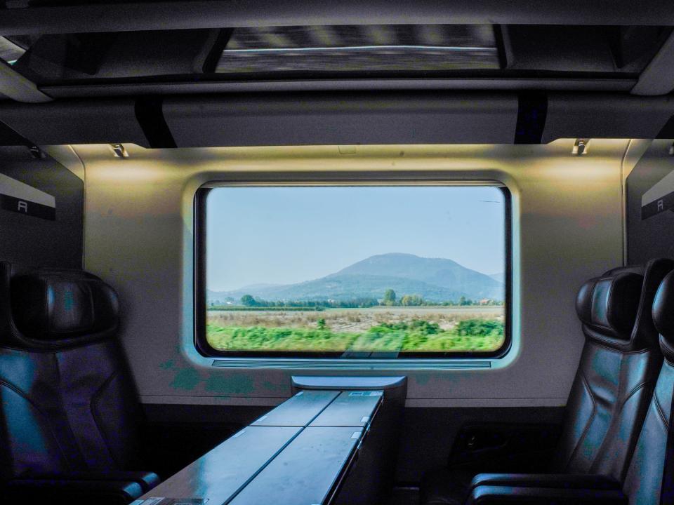 A view out the window of a train in Italy.