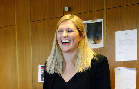 Beatrice Fihn, Executive Director of the International Campaign to Abolish Nuclear Weapons (ICAN) celebrates after winning the Nobel Peace Prize 2017, in Geneva, Switzerland October 6, 2017. REUTERS/Denis Balibouse