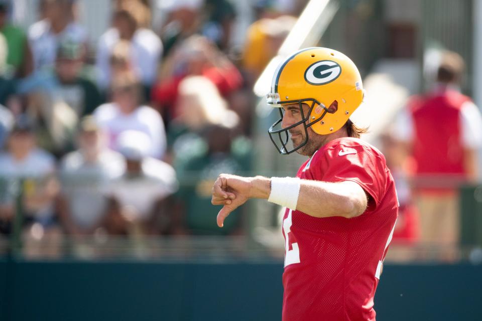 Aaron Rodgers gives a thumbs-down during practice at Ray Nitschke Field on Aug. 16.