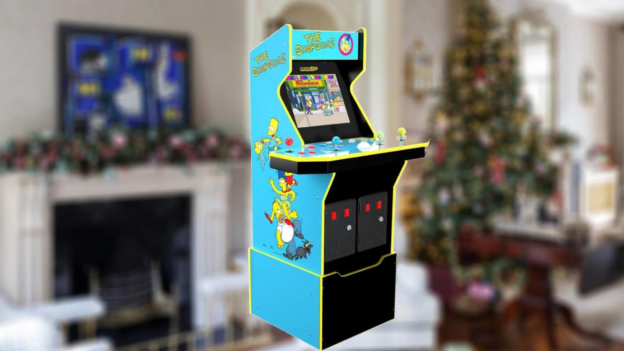  Arcade1up machine with blurred Christmas backdrop. 