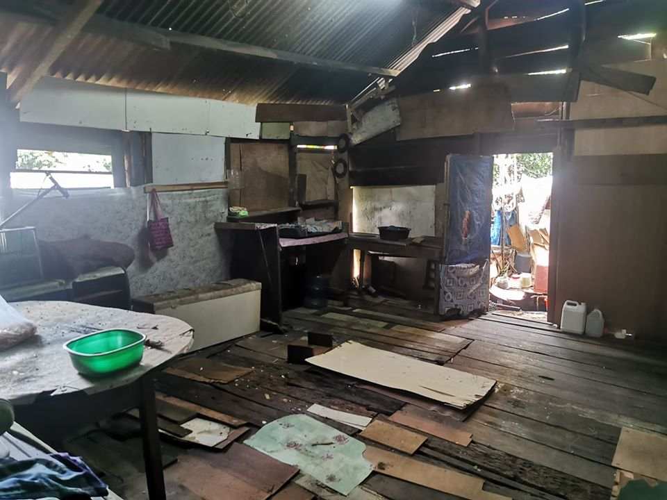 The kitchen was turned into a makeshift place to wash the body before it can be buried. — Picture from Facebook/Yunizam Yusop