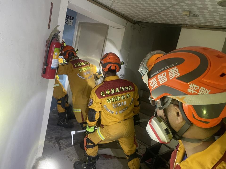 Fire fighters search inside a building for rescue operation. The Uranus Building is tilted at an angle of more than 60 degrees, and one person is still missing (Anadolu via Getty Images)