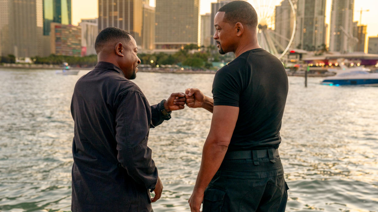  Martin Lawrence and Will Smith fist bump on the water in Bad Boys: Ride or Die. 