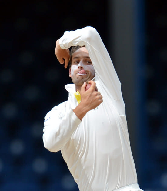 Australian bowler Nathan Lyon delivers during the third day of the second-of-three Test matches between Australia and West Indies April 17, 2012 at Queen's Park Oval in Port of Spain, Trinidad. AFP PHOTO/Stan HONDA (Photo credit should read STAN HONDA/AFP/Getty Images)