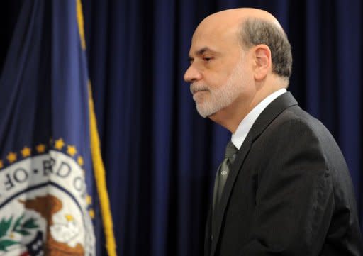 US Federal Reserve chief Ben Bernanke arrives for a news conference in Washington, DC, on September 13. The US Federal Reserve took aim at slow growth and high joblessness, announcing a new, open-ended $40 billion per month bond-buying program as it slashed its 2012 growth forecast