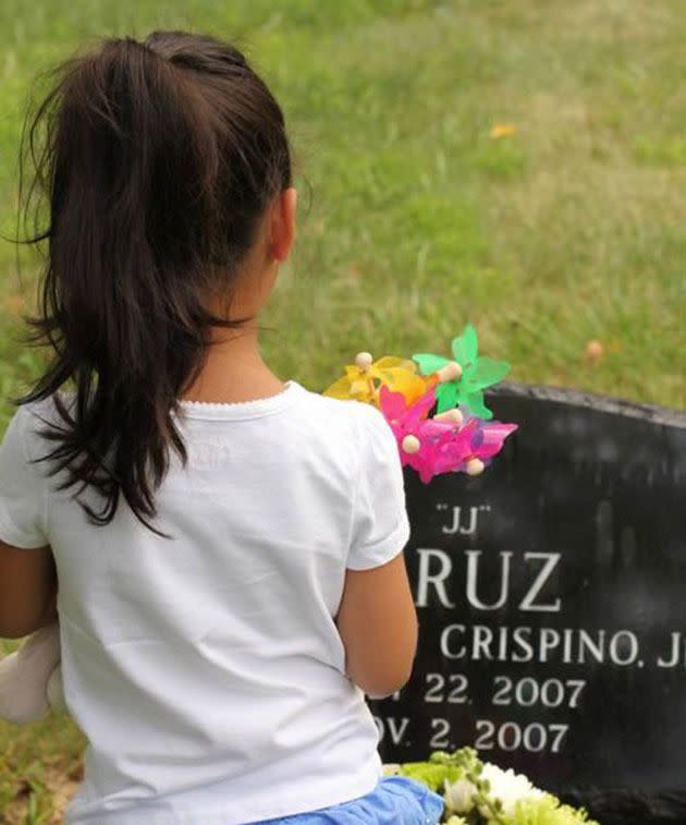 Gracie at JJ's grave. Photos courtesy of Michelle Crispino.