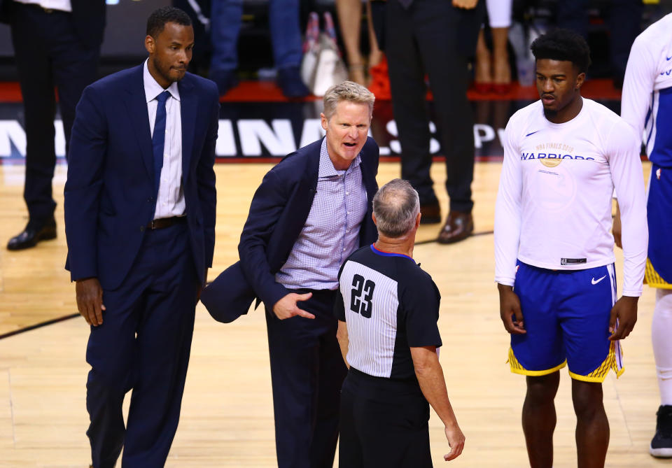 TORONTO, ONTARIO - JUNE 10:  Head coach Steve Kerr of the Golden State Warriors complains to referee Jason Phillips #23 against the Toronto Raptors in the second half during Game Five of the 2019 NBA Finals at Scotiabank Arena on June 10, 2019 in Toronto, Canada. NOTE TO USER: User expressly acknowledges and agrees that, by downloading and or using this photograph, User is consenting to the terms and conditions of the Getty Images License Agreement. (Photo by Vaughn Ridley/Getty Images)