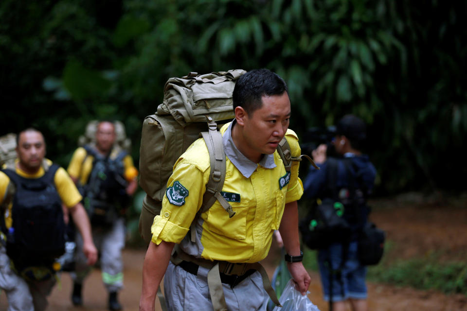 <p>A Chinese rescue team arrives near the Tham Luang cave complex as a search for members of an under-16 soccer team and their coach continues, in the northern province of Chiang Rai, Thailand, June 30, 2018. (Photo: Soe Zeya Tun/Reuters) </p>