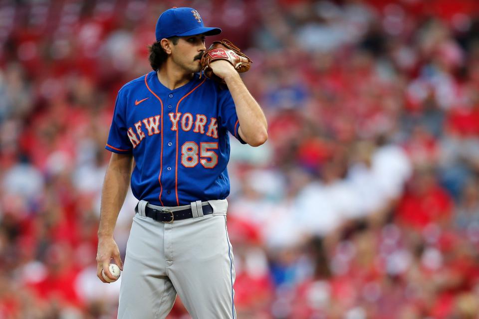 New York Mets relief pitcher Stephen Nogosek (85) takes over after starting pitcher Robert Stock left the game with an injury in the second inning of the MLB National League game between the Cincinnati Reds and the New York Mets at Great American Ball Park in downtown Cincinnati on Tuesday, July 20, 2021.