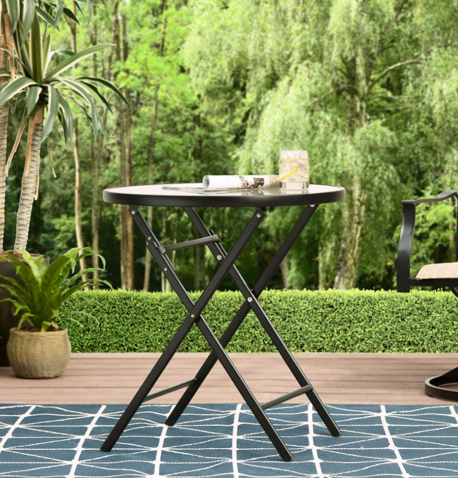 small foldable circular table outside