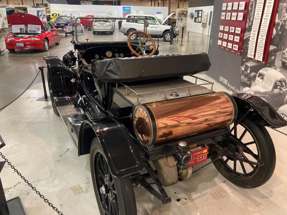 The brass water tank helped produced the steam to power this 1914 Stanley Steamer.