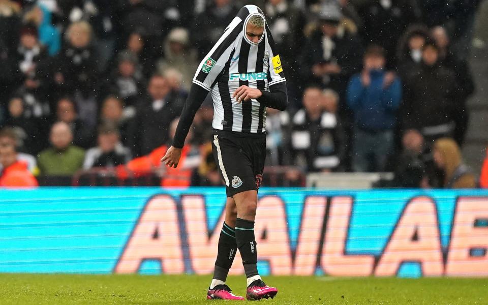 Newcastle United's Bruno Guimaraes appears dejected after being shown a red card for serious foul play during the Carabao Cup Semi Final second leg match at St. James's Park, Newcastle upon Tyne - Owen Humphreys/PA