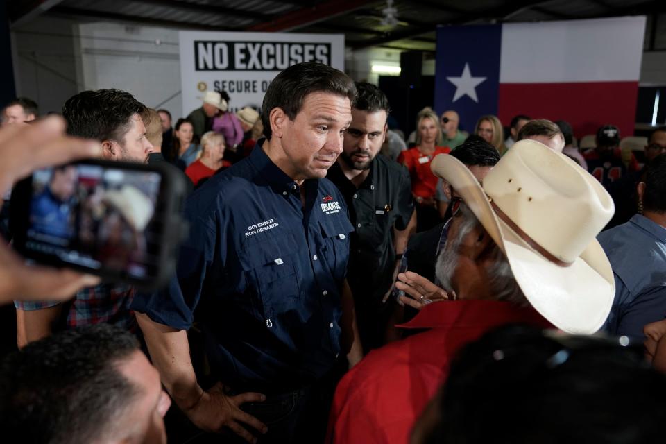 Republican presidential candidate Florida Gov. Ron DeSantis greets people at a town hall meeting in Eagle Pass, Texas, on June 26.