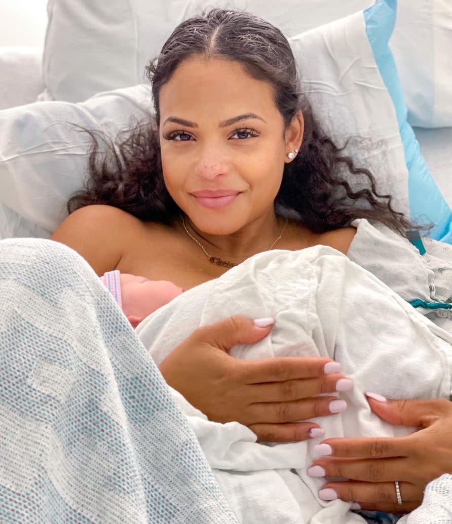 <p>Even after giving birth, <a href="https://people.com/tag/christina-milian/" rel="nofollow noopener" target="_blank" data-ylk="slk:Christina Milian;elm:context_link;itc:0;sec:content-canvas" class="link ">Christina Milian</a> looks gorgeous.</p> <p>On April 24, the singer gave birth to her third child, a baby boy named <a href="https://people.com/parents/christina-milian-welcomes-baby-boy-third-child/" rel="nofollow noopener" target="_blank" data-ylk="slk:Kenna;elm:context_link;itc:0;sec:content-canvas" class="link ">Kenna</a>.</p> <p>The "Dip It Low" singer and her boyfriend Matt Pokora share her newborn son Kenna and another baby boy named <a href="https://people.com/parents/christina-milian-welcomes-son-isaiah/" rel="nofollow noopener" target="_blank" data-ylk="slk:Isaiah;elm:context_link;itc:0;sec:content-canvas" class="link ">Isaiah</a>, 14 months. The singer is also mom to 11-year-old daughter <a href="https://people.com/parents/christina-milian-welcomes-daughter-violet-madison/" rel="nofollow noopener" target="_blank" data-ylk="slk:Violet Madison;elm:context_link;itc:0;sec:content-canvas" class="link ">Violet Madison</a>, whom she shares with ex-husband <a href="https://people.com/celebrity/christina-milian-the-dream-secretly-separated-in-february/" rel="nofollow noopener" target="_blank" data-ylk="slk:The-Dream;elm:context_link;itc:0;sec:content-canvas" class="link ">The-Dream</a>.</p> <p>Milian <a href="https://people.com/parents/christina-milian-pregnant-expecting-third-child/" rel="nofollow noopener" target="_blank" data-ylk="slk:told PEOPLE last year;elm:context_link;itc:0;sec:content-canvas" class="link ">told PEOPLE last year</a> that getting to spend quality time with her kids in the pandemic was a blessing. </p> <p>"I'm super happy. I have a really happy baby," Milian said. "Honestly, with all this stuff going on, it kind of was a blessing in disguise to be able to spend so much time together and to not be forced to rush right back to work. It's been nice to just be home and be with my daughter <a href="https://people.com/parents/christina-milian-pregnant-baby-shower-son/" rel="nofollow noopener" target="_blank" data-ylk="slk:and have this bonding experience;elm:context_link;itc:0;sec:content-canvas" class="link ">and have this bonding experience</a>."</p>