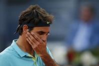 Roger Federer of Switzerland reacts during his match against Nick Kyrgios of Australia at the Madrid Open tennis tournament in Madrid, Spain, May 6, 2015. REUTERS/Susana Vera