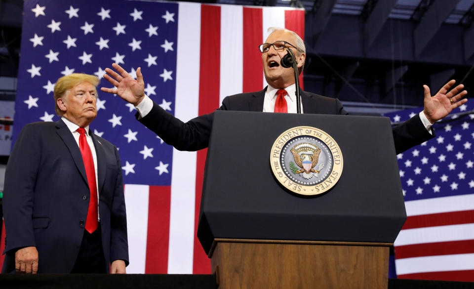 President Trump listens at a rally in support of Rep. Kevin Cramer, right, in his run for the Senate in Fargo, N.D., June 27, 2018. (Photo: Kevin Lamarque/Reuters)