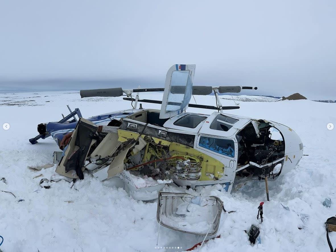 A photo posted to Facebook last summer by Devon Manik shows a helicopter that crashed on Devon Island, Nunavut, on June 28. Three people suffered minor injuries in the crash. (Submitted by Devon Manik - image credit)