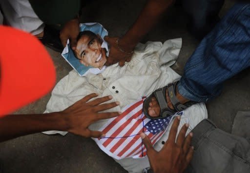 Pakistani protesters beat an effigy of the US President Barack Obama during a rally in Karachi against an anti-Islam movie. The Pakistani Taliban have issued a call for Muslims worldwide and within the country to rise up against an anti-Islam movie. Washington has deployed anti-terror forces to cope with a wave of global violence over a film mocking Islam