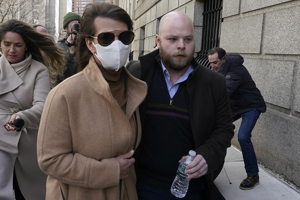 Juror No. 50, right, from the Ghislaine Maxwell trial, leaves federal court, in New York, Tuesday, March 8, 2022. The juror told a judge Tuesday that failing to disclose his child abuse history during jury selection at the trial of the British socialite was one of the "biggest mistakes" of his life, as a judge and lawyers try to decide whether the revelations will spoil Maxwell's sex trafficking conviction. (AP Photo/Richard Drew)