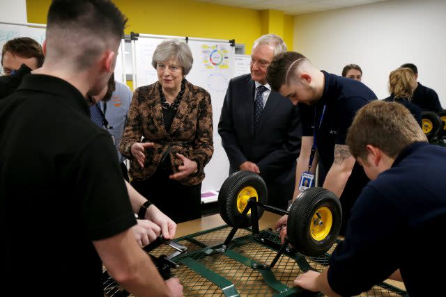 Theresa May visits an engineering training facility in the West Midlands