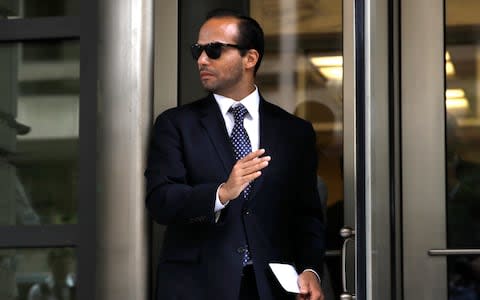 George Papadopoulos, former foreign policy adviser to Donald Trump, left the federal court in Washington after being sentenced to 14 days in prison for lying to the FBI. His claims that Britain and Australia had colluded with the FBI were the start of the Mueller probe into Russian interference in the US - Credit: AP Photo/Jacquelyn Martin