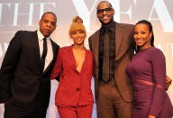 Miami Heat player LeBron James had plenty of supporters on hand when he accepted his 2012 Sportsman of the Year award in New York on Wednesday, including Jay-Z, Beyonce, and LeBron's fiancee, Savannah Brinson (far right). (12/5/2012)