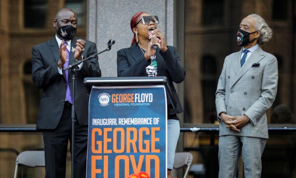 George Floyd’s sister Bridgett speaks on stage between Floyd family attorney Ben Crump and Reverend Al Sharpton during a rally hosted by the George Floyd Global Memorial in Minneapolis.