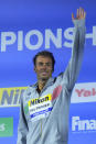 Italy's Gregorio Paltrinieri celebrates after winning the men's 1500m freestyle final at the 19th FINA World Championships in Budapest, Hungary, Saturday, June 25, 2022. (AP Photo/Petr David Josek)