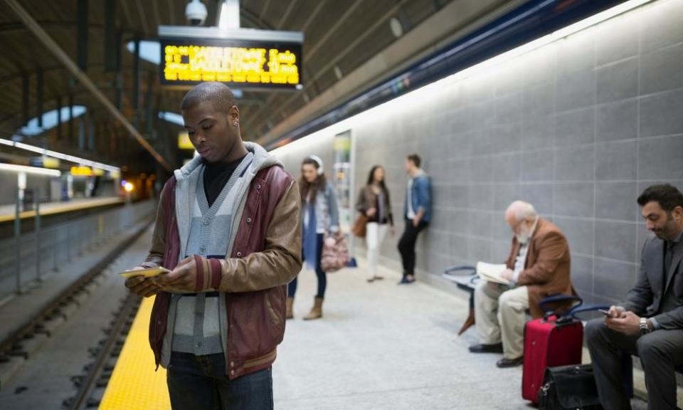 Commuters on subway station in Canada.