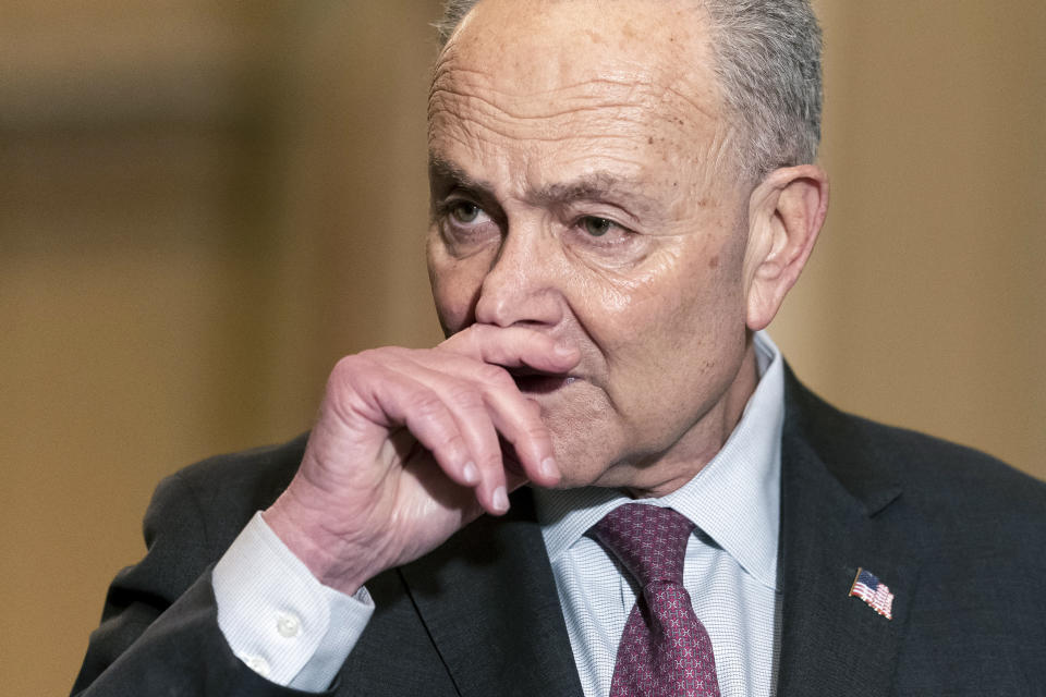 Senate Majority Leader Chuck Schumer of N.Y., listens to reporters during a news conference, Tuesday, Feb. 15, 2022, after a Democratic weekly policy luncheon on Capitol Hill in Washington.(AP Photo/Mariam Zuhaib)