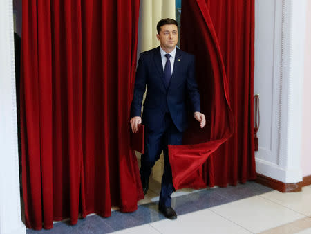 FILE PHOTO: Volodymyr Zelenskiy, Ukrainian comic actor and candidate in the upcoming presidential election, takes part in a production of the Servant of the People television series in Kiev, Ukraine March 6, 2019. REUTERS/Valentyn Ogirenko/File Photo