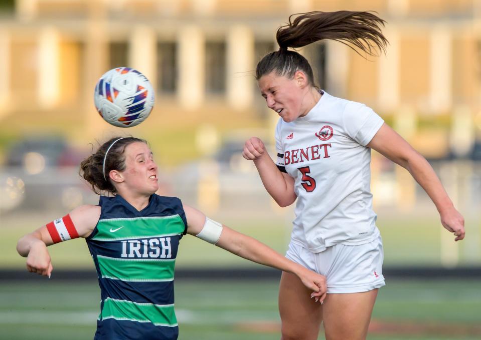 Peoria Notre Dame's Claire Girard, left, and Benet Academy's Reese MacDonald head the ball during their Class 2A supersectional soccer match Tuesday, May 30, 2023 in Washington. The Irish fell to the Redwings 1-0 in overtime.