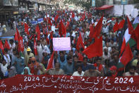 Members of National Trade Union Federation Pakistan take part in a May Day rally, marking International Labour Day in Karachi, Pakistan, Wednesday, May 1, 2024. Participants of the rally demand implementation of labor laws and increase in their wages. (AP Photo/Ikram Suri)