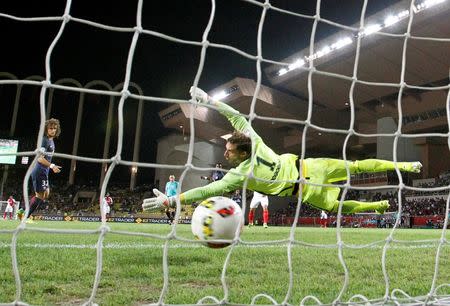 Football Soccer - Monaco v Paris St Germain - French Ligue 1 - Louis II stadium, 28/08/16. Monaco's Joao Moutinho scores against Paris St Germain's goalkeeper Kevin Trapp. REUTERS/Eric Gaillard