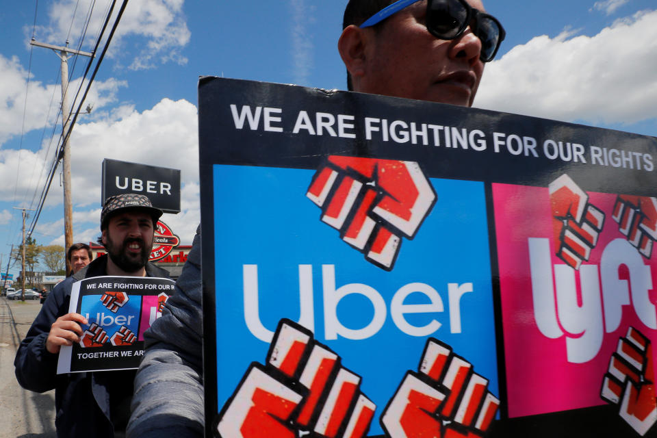 Uber and Lyft drivers protest during a day-long strike outside Uber’s office in Saugus, Massachusetts, U.S., May 8, 2019.   REUTERS/Brian Snyder