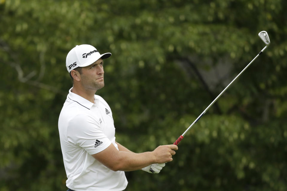 Jon Rahm, of Spain, hits from the 14th tee during the second round of the Memorial golf tournament, Friday, July 17, 2020, in Dublin, Ohio. (AP Photo/Darron Cummings)