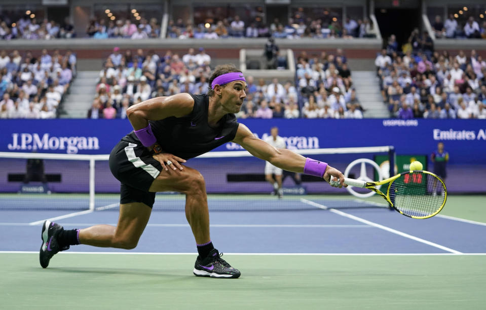 Rafael Nadal, of Spain, returns a shot to Daniil Medvedev, of Russia, during the men's singles final of the U.S. Open tennis championships Sunday, Sept. 8, 2019, in New York. (AP Photo/Eduardo Munoz Alvarez)