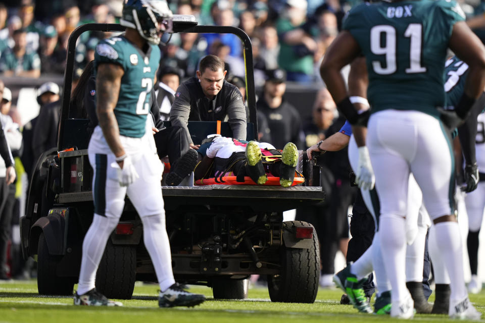Philadelphia Eagles defensive end Josh Sweat (94) is carted off the field after being injured in the first half of an NFL football game against the New Orleans Saints in Philadelphia, Sunday, Jan. 1, 2023. (AP Photo/Matt Slocum)