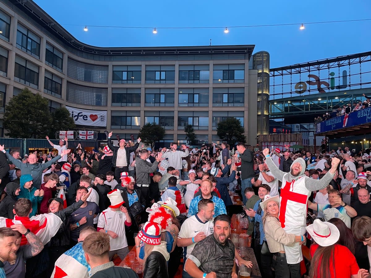 England fans cheer after Cole Palmer equalises during the Euro Finals at the Newcastle fan zone  (Tom Watling )